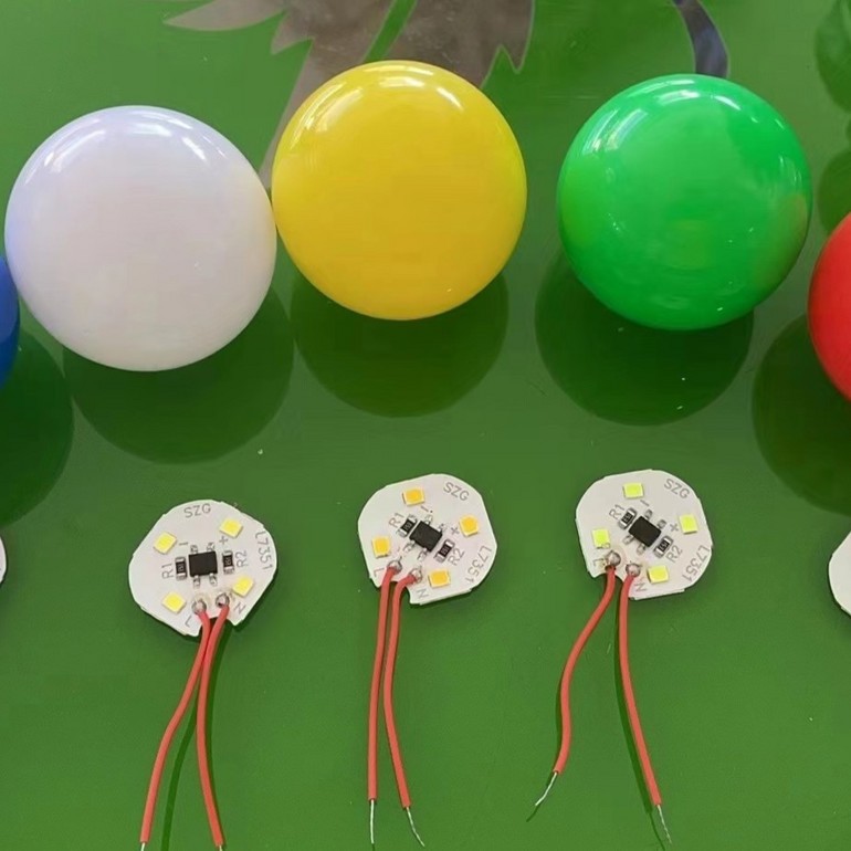 Colored shells decorate bulb lights