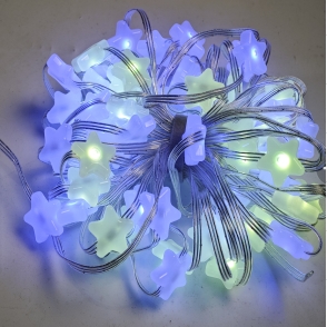 Violet color bright yellow star string lights
