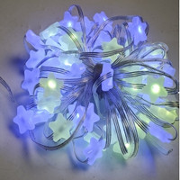 Violet color bright yellow star string lights