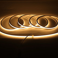 Low pressure self-adhesive silicone strip light